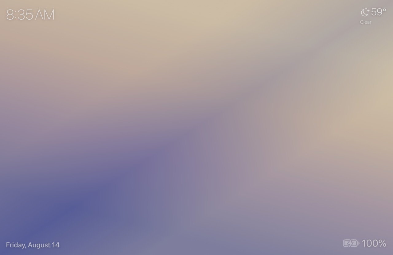 The Gradient screensaver — a soft wash of color with a clock overlay